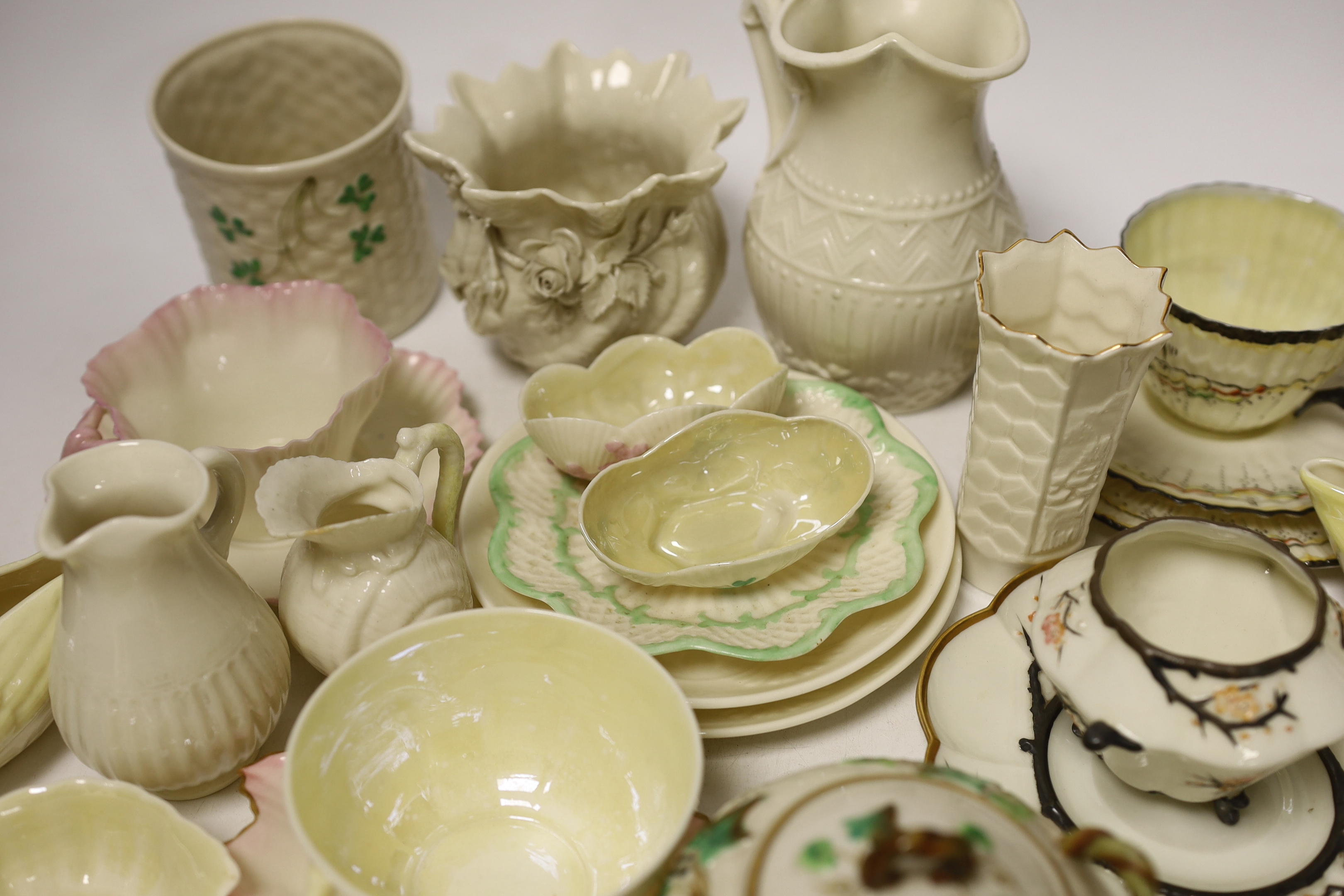 A quantity of Belleek porcelain tea and decorative wares, 1st period and later